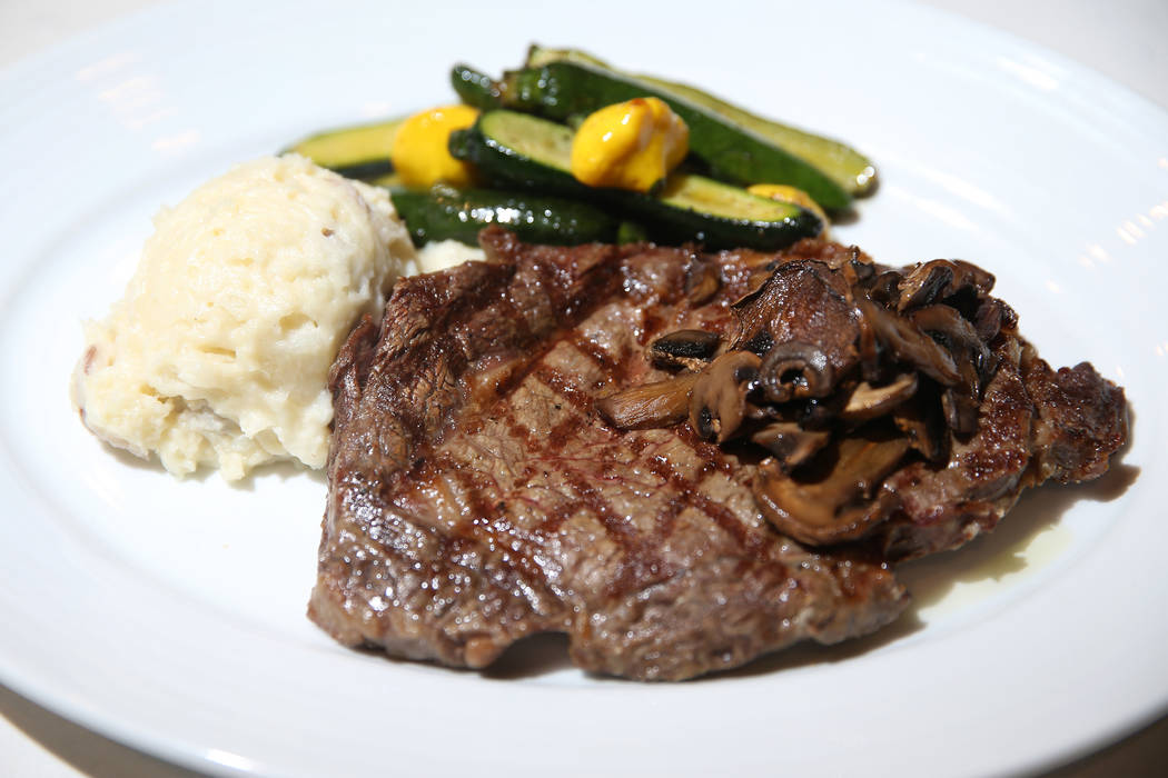 The Earl Grey rib eye served with mushrooms, red mashed potatoes and vegetables, at Earl Grey C ...