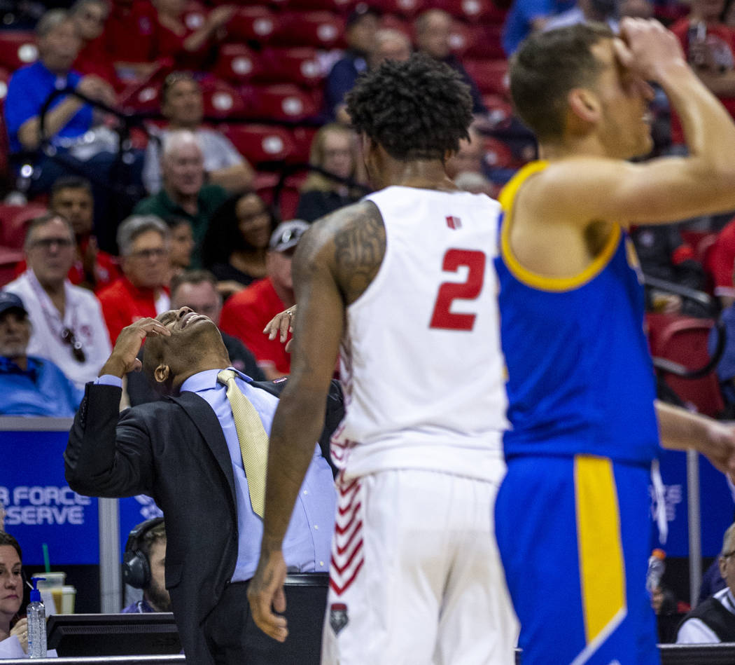 The San Jose State Spartans head coach Jean Prioleau, left, reacts to a foul call in their firs ...