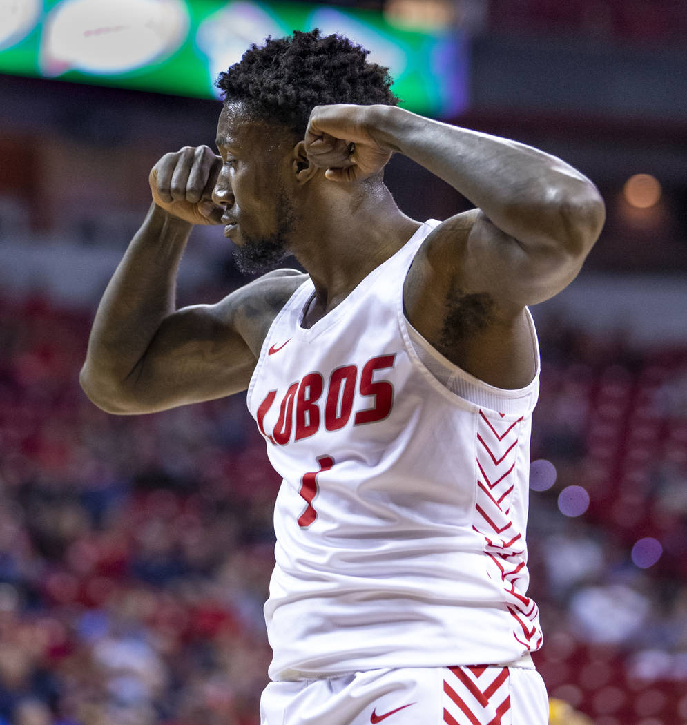 New Mexico Lobos forward Corey Manigault (1) flexes some muscle versus the San Jose State Spart ...