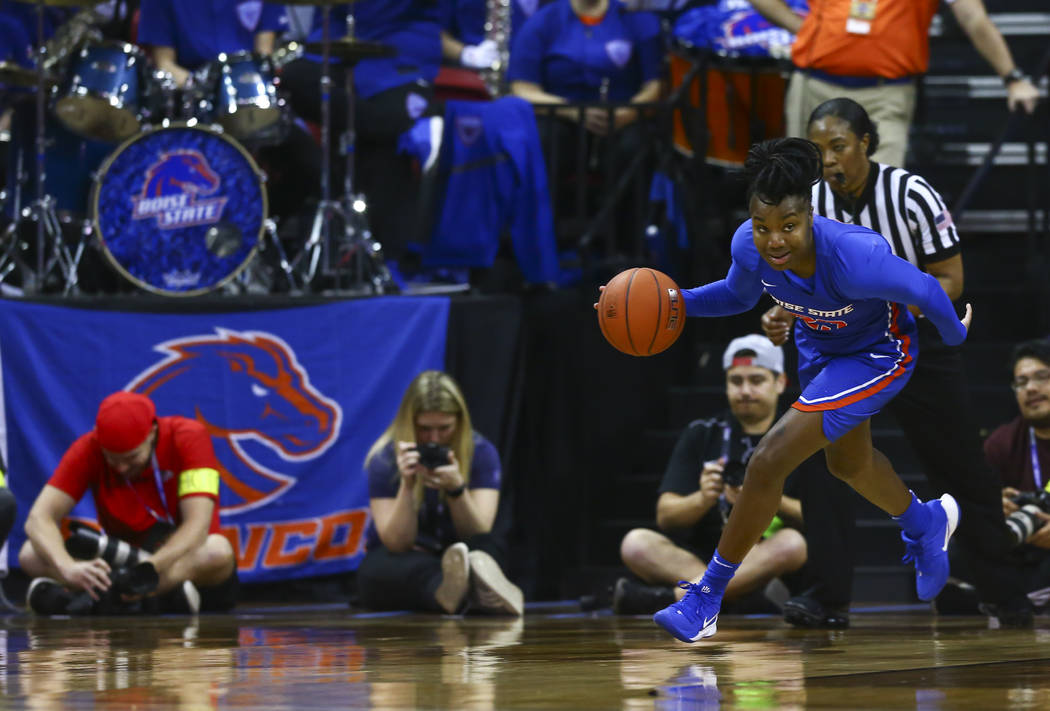 Boise State Broncos' Jayde Christopher (23) brings the ball up court during the first half of t ...