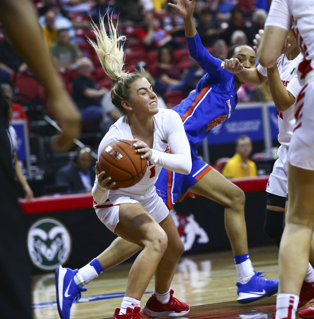 Fresno State Bulldogs' Haley Cavinder (1) gets possession of a rebound in front of Boise State ...