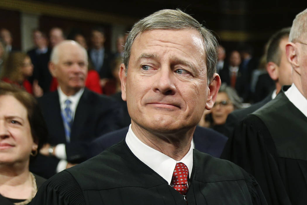 FILE - In this Jan. 12, 2016 file photo, Chief Justice John Roberts arrives for the State of th ...