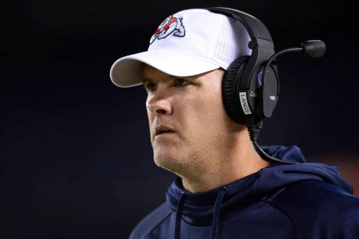 Fresno State Bulldogs quarterbacks coach Danny Langsdorf looks on from the sideline during the ...