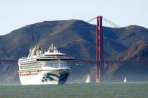 FILE - In this Feb. 11, 2020, file photo, the Grand Princess cruise ship passes the Golden Gate ...