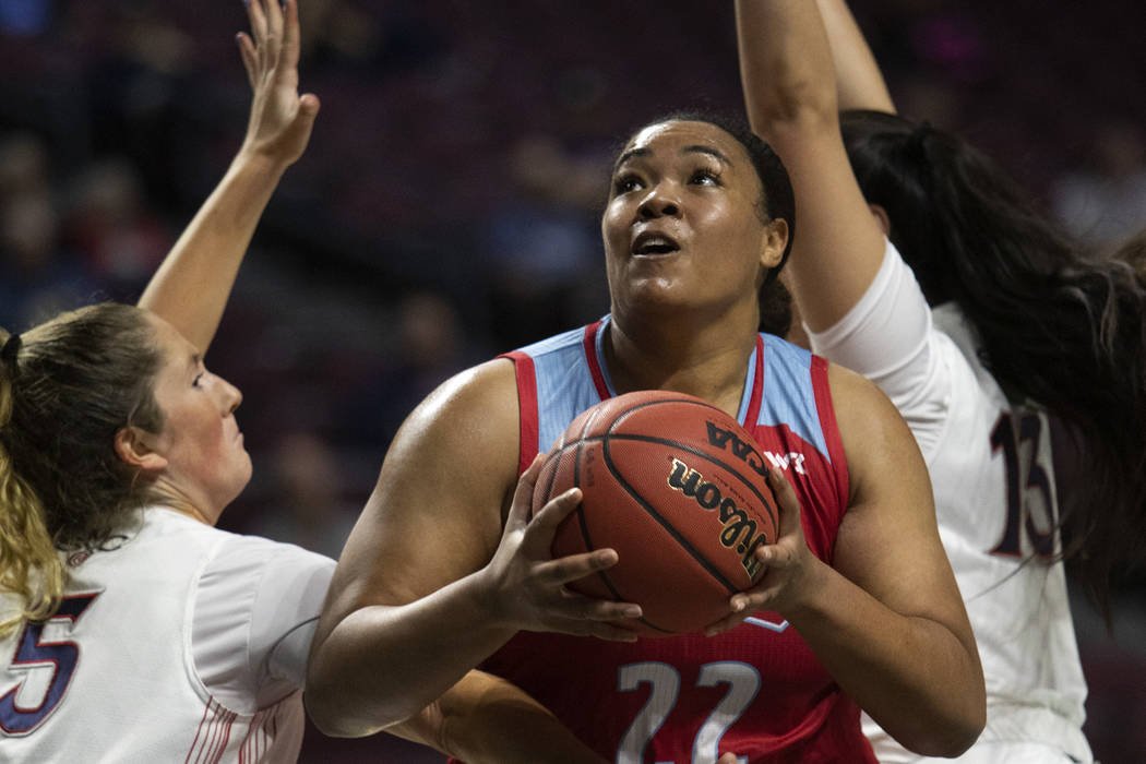 Loyola Marymount's center Raychel Stanley (22) attempts a point during the first round of the W ...