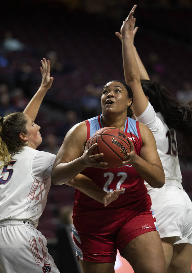 Loyola Marymount's center Raychel Stanley (22) attempts a point during the first round of the W ...