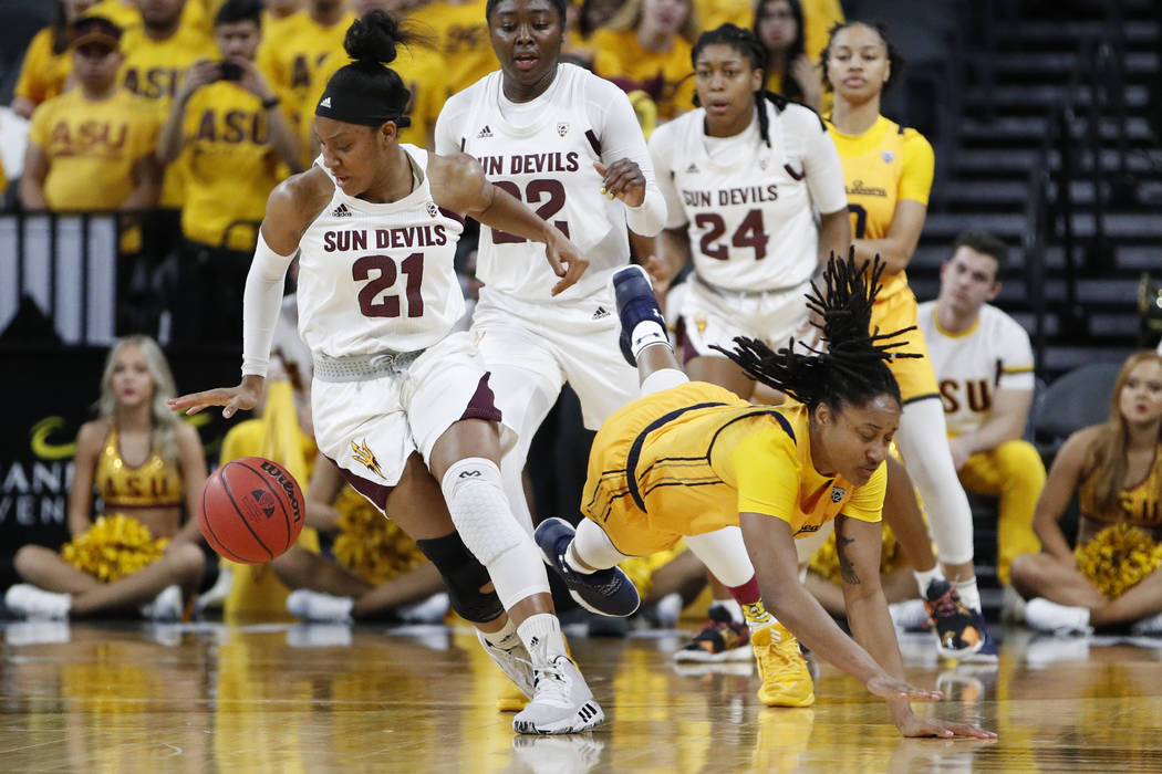 California's Jaelyn Brown, right, tries to steal the ball from Arizona State's Sydnei Caldwell ...