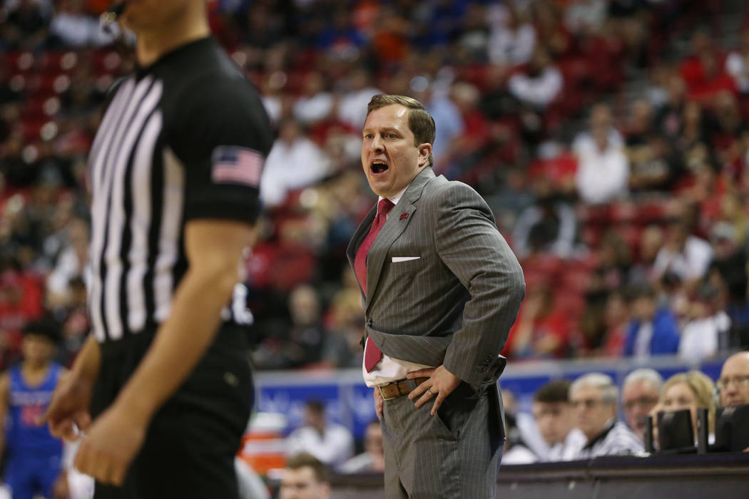 UNLV Rebels head coach T. J. Otzelberger reacts after a play against Boise State Broncos during ...