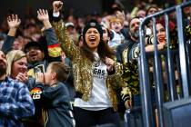 Golden Knights fans celebrate a goal by Tomas Nosek, not pictured, during the first period of a ...