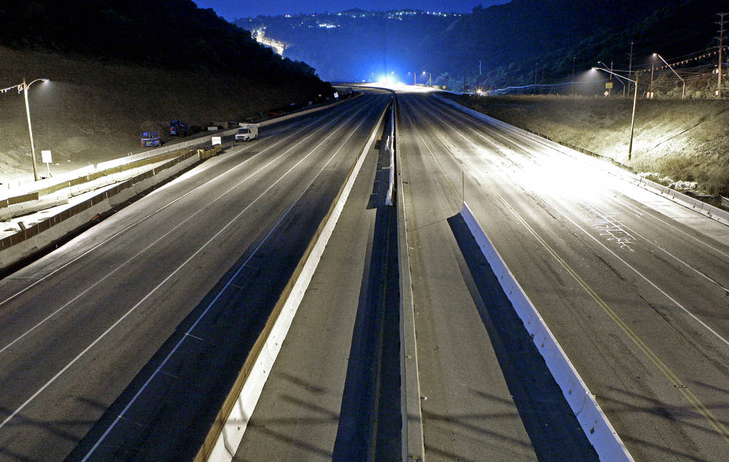 Interstate 405 is free of traffic just past midnight, seen looking south from the Skirball Driv ...