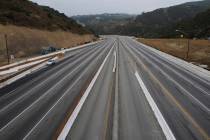 Interstate 405 is free of traffic, seen looking south from the Skirball Drive bridge, in 2011 i ...
