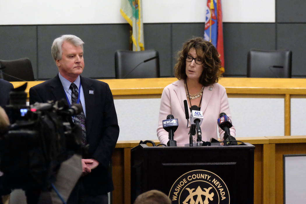 Interim Washoe County schools Superintendent Kristen McNeill, at right, speaks to reporters Fri ...