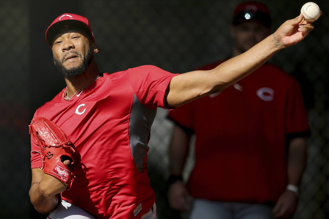 Cincinnati Reds relief pitcher Amir Garrett (50) throws during spring training baseball, Friday ...