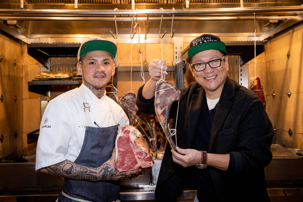 Manzo's Arnold Corpuz give Masaharu Morimoto a tour of his restaurant. (Erik Kabik/Kabik Photo ...