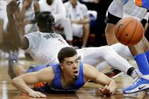 Boise State's Alex Hobbs (34) and San Diego State's Aguek Arop (3) go for a loose ball during t ...