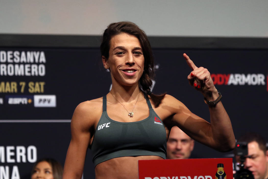 UFC strawweight Joanna Jedrzejczyk poses on the scale during the UFC 248 ceremonial weigh-ins a ...