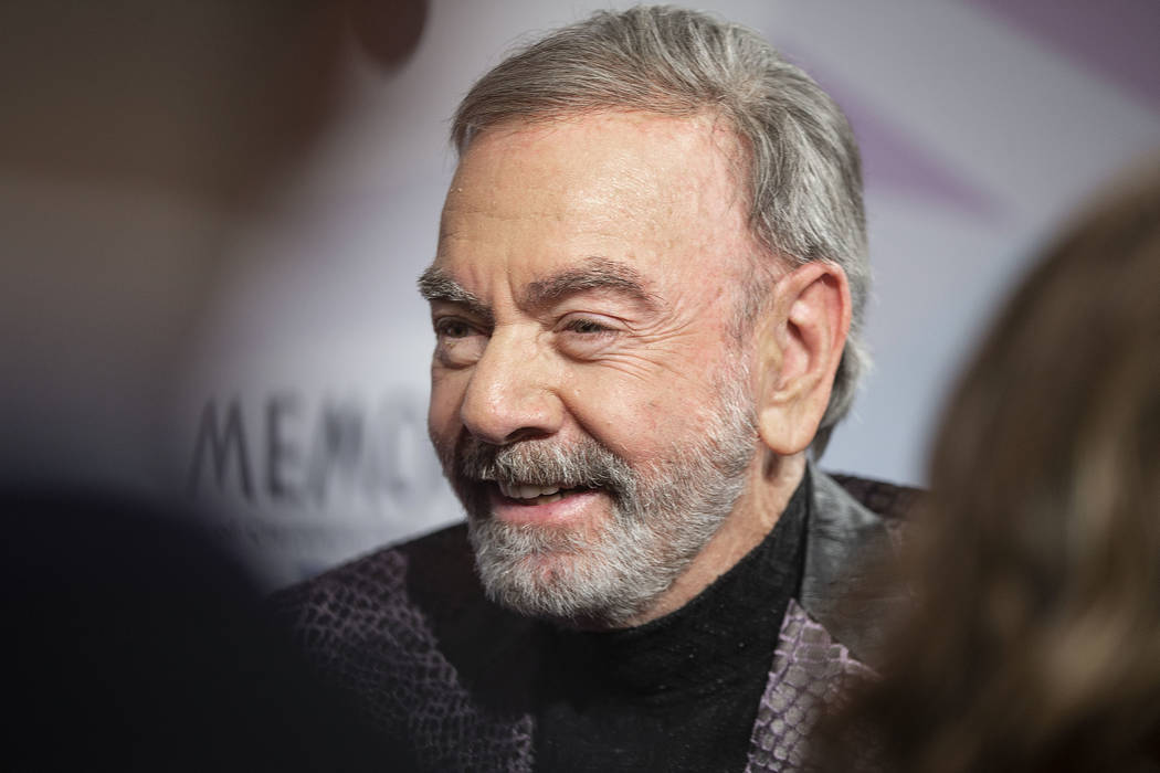 Neil Diamond talks with the media on the red carpet during the 24th Annual Power of Love Gala o ...