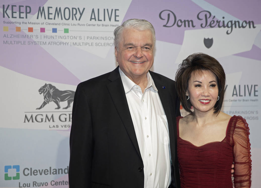Gov. Steve Sisolak, left, and wife Kathy walk the red carpet during the 24th Annual Power of Lo ...