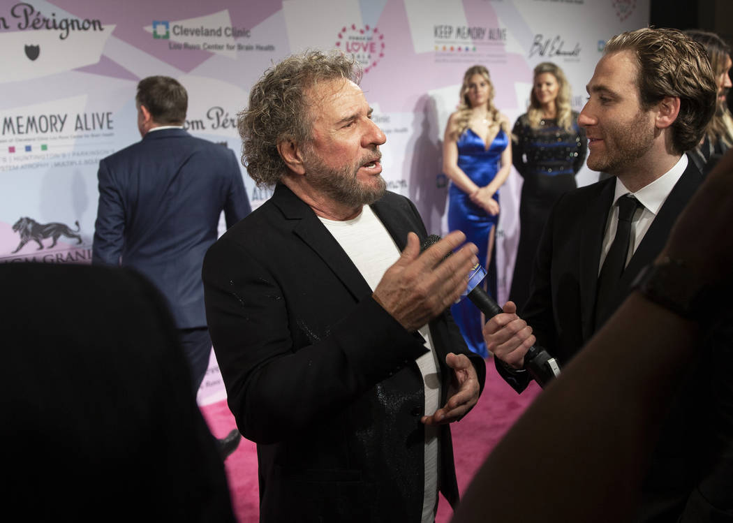 Sammy Hagar, middle, talks with the media on the red carpet during the 24th Annual Power o ...