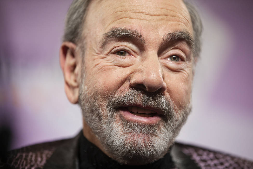Neil Diamond speaks with the media on the red carpet during the 24th Annual Power of Love Gala ...