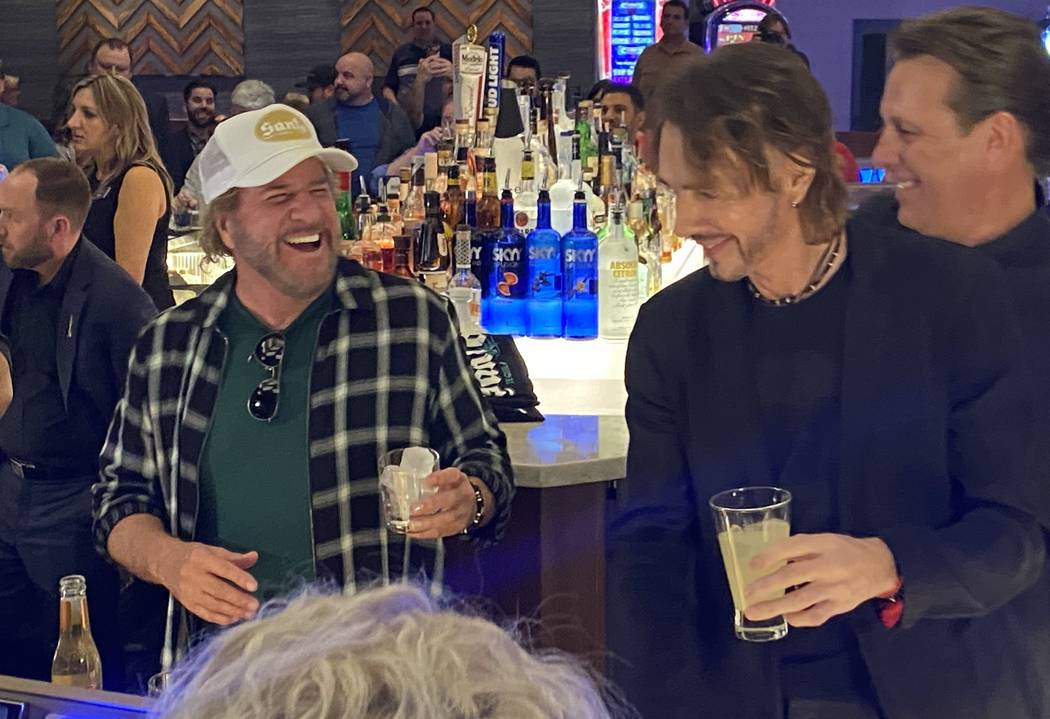 Sammy Hagar, left, and Rick Springfield tend bar at The Strat Hotel on Wednesday, Jan. 22, 2020 ...