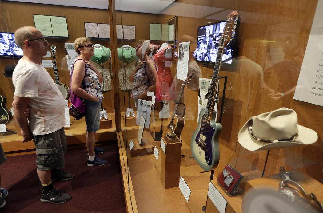 FILE - In this May 25, 2018 photo, visitors to the Country Music Hall of Fame and Museum in Nas ...
