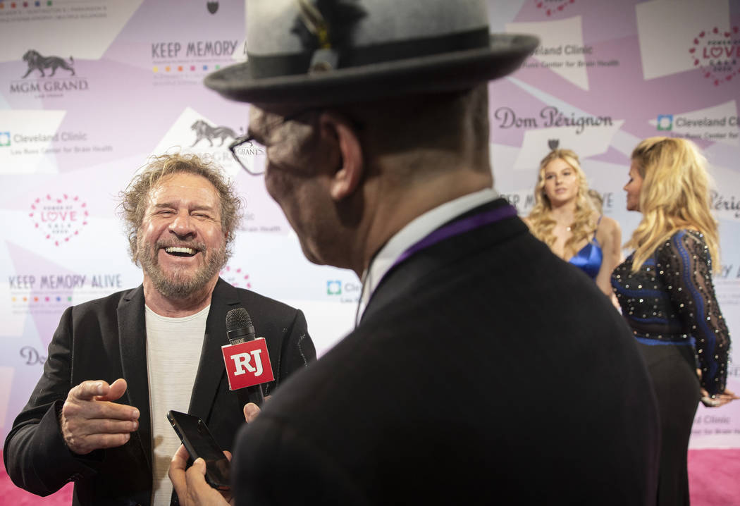 Sammy Hagar, left, shares a laugh with the media on the red carpet during the 24th Annual Power ...