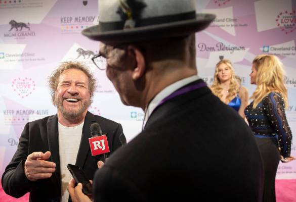 Sammy Hagar, left, shares a laugh with the media on the red carpet during the 24th Annual Power ...