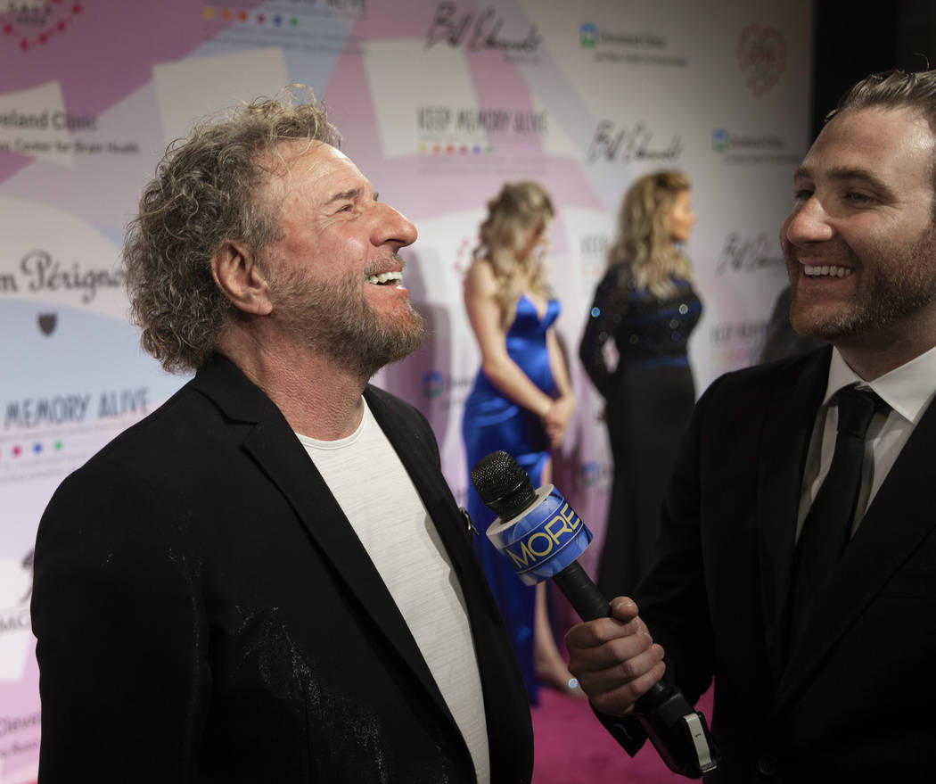 Sammy Hagar, left, talks with the media on the red carpet during the 24th Annual Power of ...