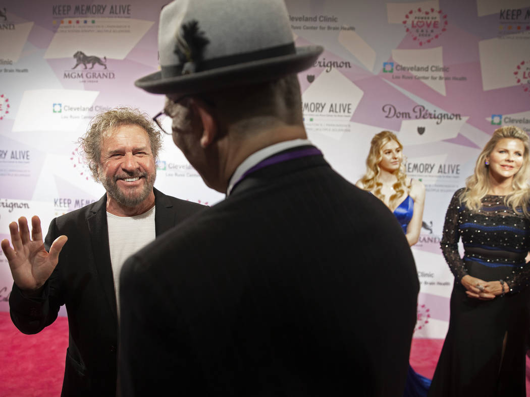 Sammy Hagar, left, shares a laugh with the media on the red carpet during the 24th Annual Power ...