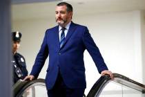 In a Jan. 29, 2020, file photo, Sen. Ted Cruz, R-Texas, rides an escalator before speaking with ...