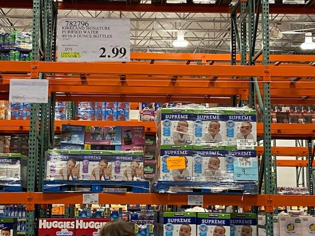 Empty shelves thatt used to hold cases of water are seen at a Costco at 3412 St. Rose Parkway i ...