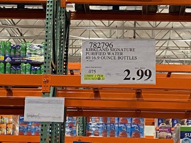 Empty shelves that used to hold cases of water are seen at a Costco at 3412 St. Rose Parkway in ...