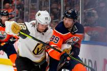 Edmonton Oilers' Alex Chiasson (39) jostles with Vegas Golden Knights' Nick Holden (22) during ...