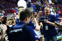 David Fague, director of the Gonzaga band, leads the group before the start of a West Coast Con ...