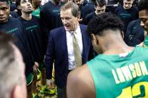 Oregon coach Dana Altman talks to the team before an NCAA college basketball game against Stanf ...