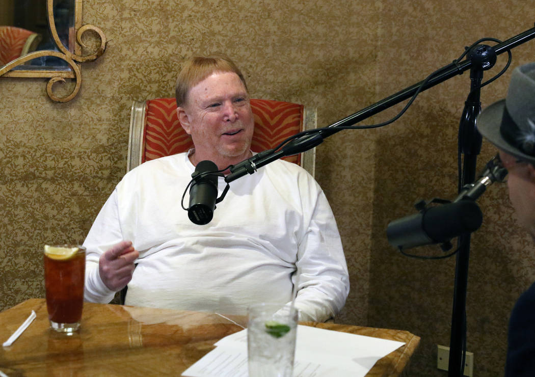 Las Vegas Raiders owner Mark Davis, left, speaks during his podcast with John Katsilometes on M ...