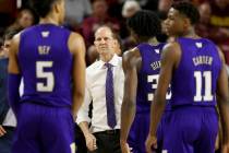 Washington head coach Mike Hopkins waits for his player during a timeout against Arizona State ...