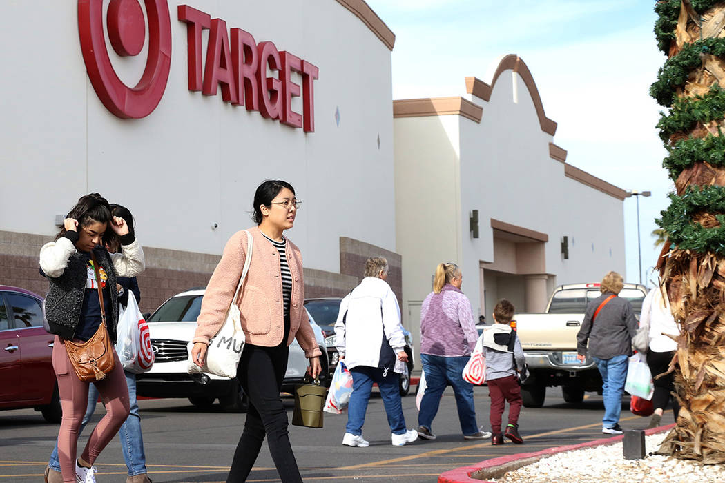 Shoppers leave Target on Monday, Dec. 24, 2018, in Henderson. (Bizuayehu Tesfaye / Las Vegas Re ...