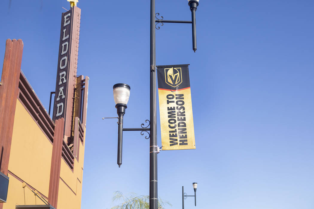 Golden Knights banners adorn light posts on South Water Street in Henderson on Wednesday, Aug. ...