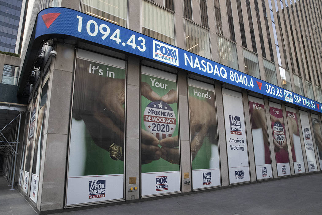 The Fox Business news ticker displays information on the financial markets above Fox News elect ...