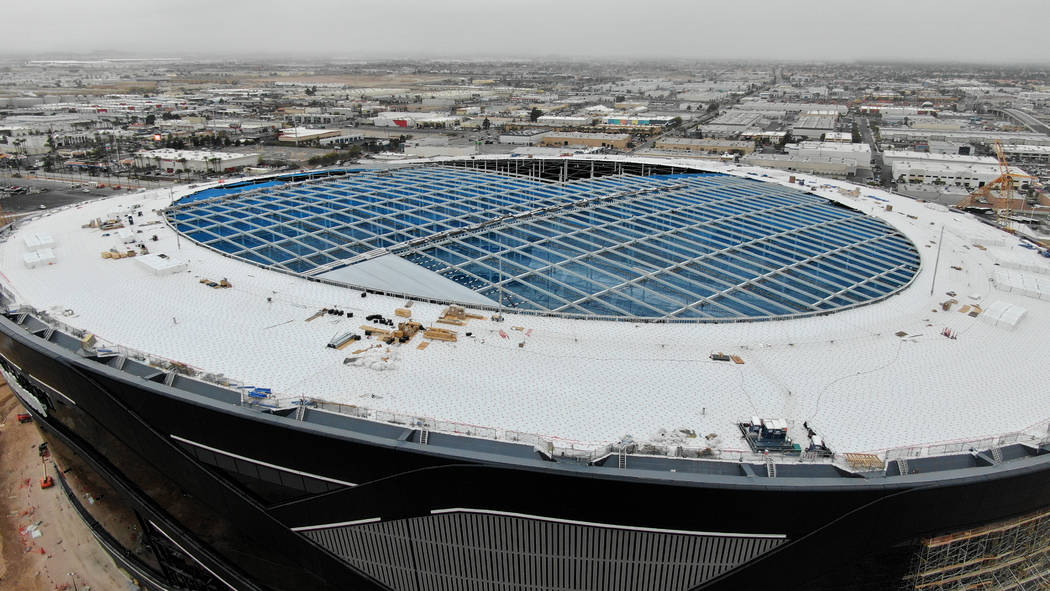 Aerial view of Allegiant Stadium shows the initial installation of the first ETFE panels near t ...
