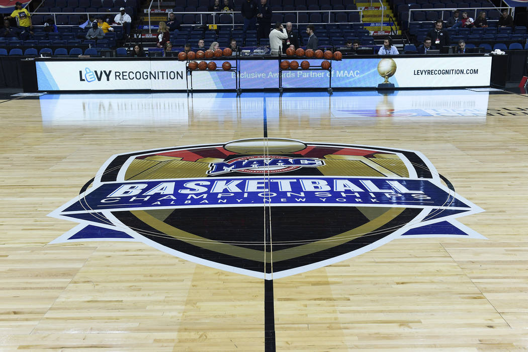 Painted logo on hardwood floor during the first half of the championship NCAA college basketbal ...
