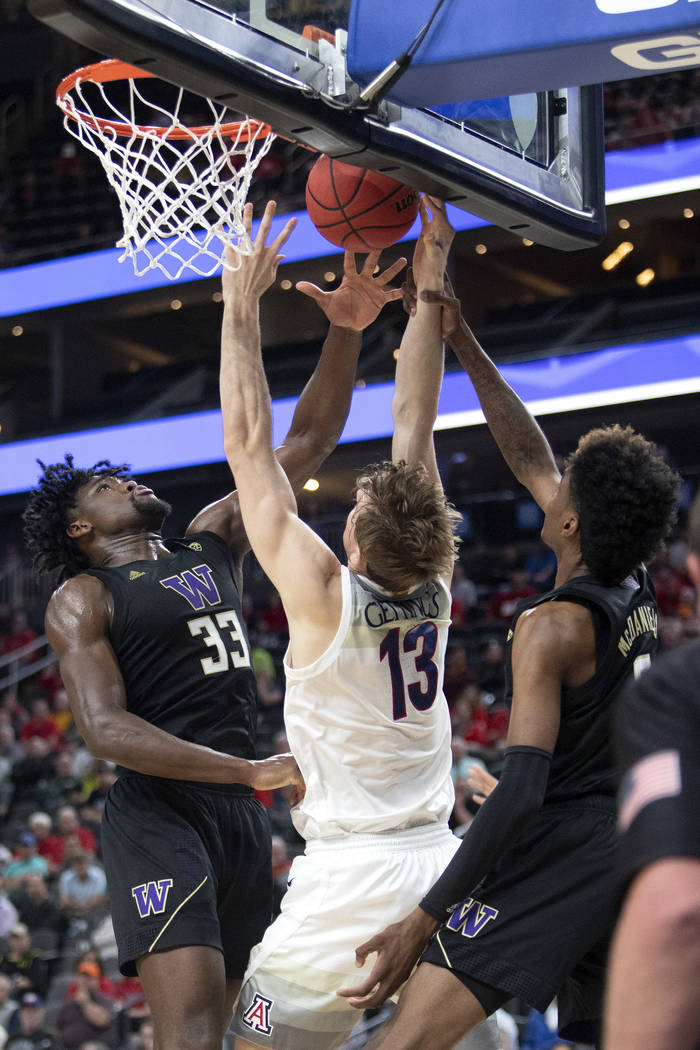 University of Washington's forward Isaiah Stewart (33) blocks a shot by University of Arizona's ...