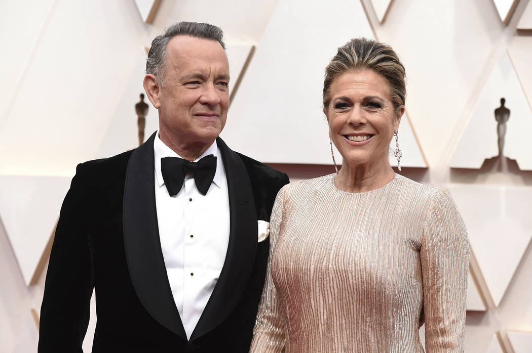 FILE - In this Feb. 9, 2020 file photo, Tom Hanks, left, and Rita Wilson arrive at the Oscars a ...