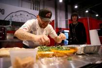 Federico De Silvestri of Verona, Italy, competes in the finals for the non-traditional pizza ca ...