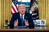 President Donald Trump speaks in an address to the nation from the Oval Office at the White Hou ...