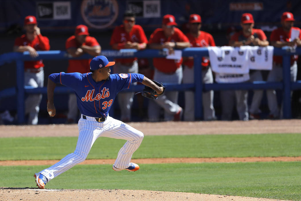 New York Mets pitcher Edwin Diaz throws to the St. Louis Cardinals during the seventh inning of ...