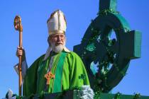 Scott Rice, with Southern Nevada Sons and Daughters of Erin, dresses as Saint Patrick to lead t ...