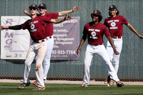 Desert Oasis baseball players warm up during a light practice at the school in Las Vegas Wednes ...